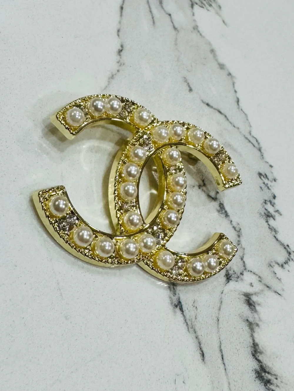 CHANEL Gold Pearl CC Logo Brooch on Navy Silk